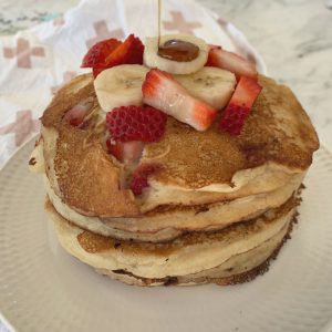 Stack of Strawberry and Banana Pancakes side view