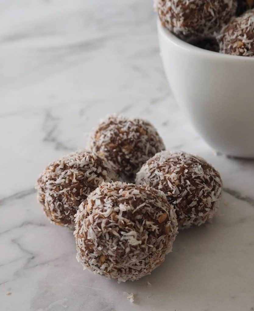 Protein Balls sitting in front of bowl