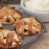caramel apple pies in muffin tin