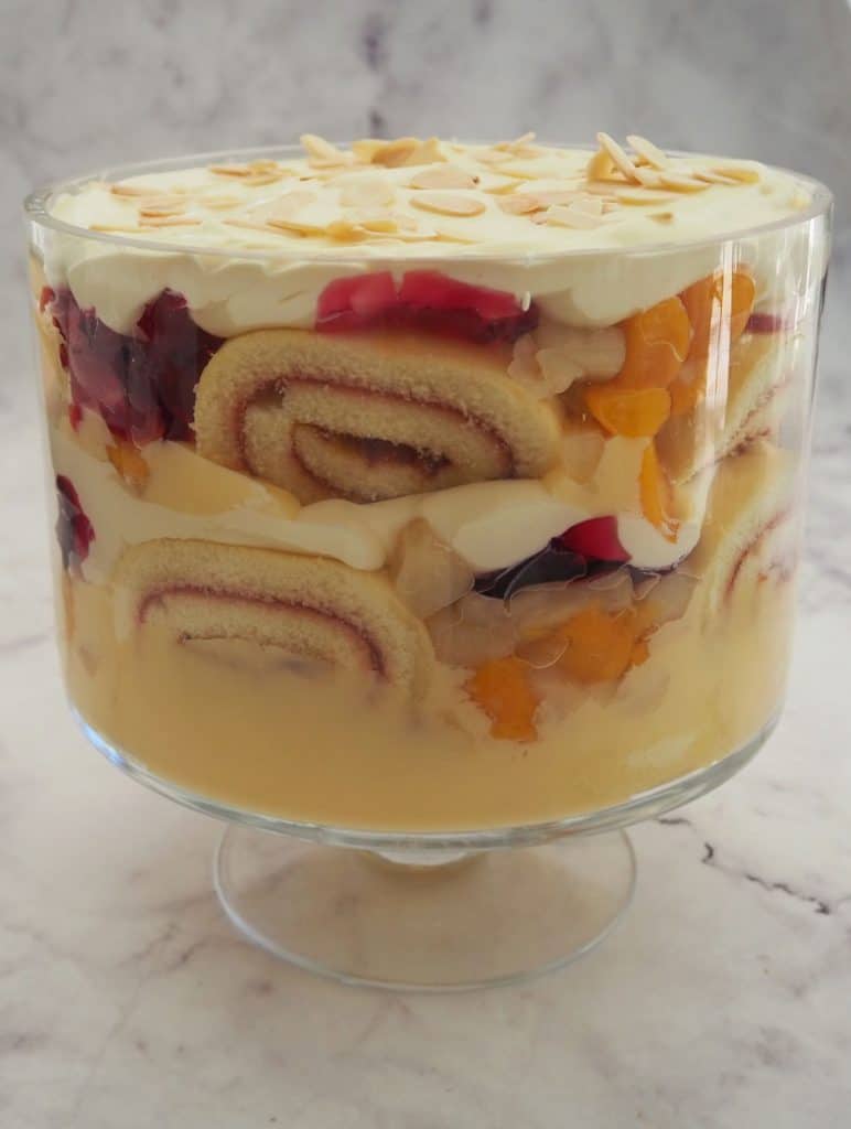 Trifle in a glass bowl on marble background