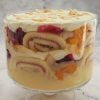 Trifle in a glass bowl on marble background
