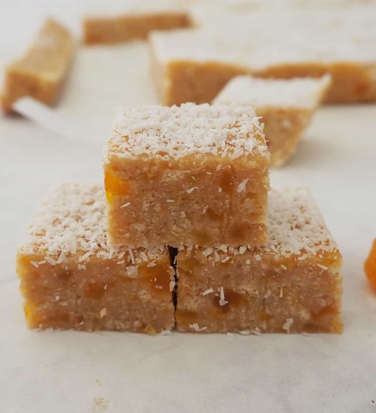 3 pieces of apricot slice stacked on top of each other.