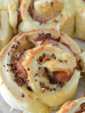 overhead view of ham cheese and mustard scrolls