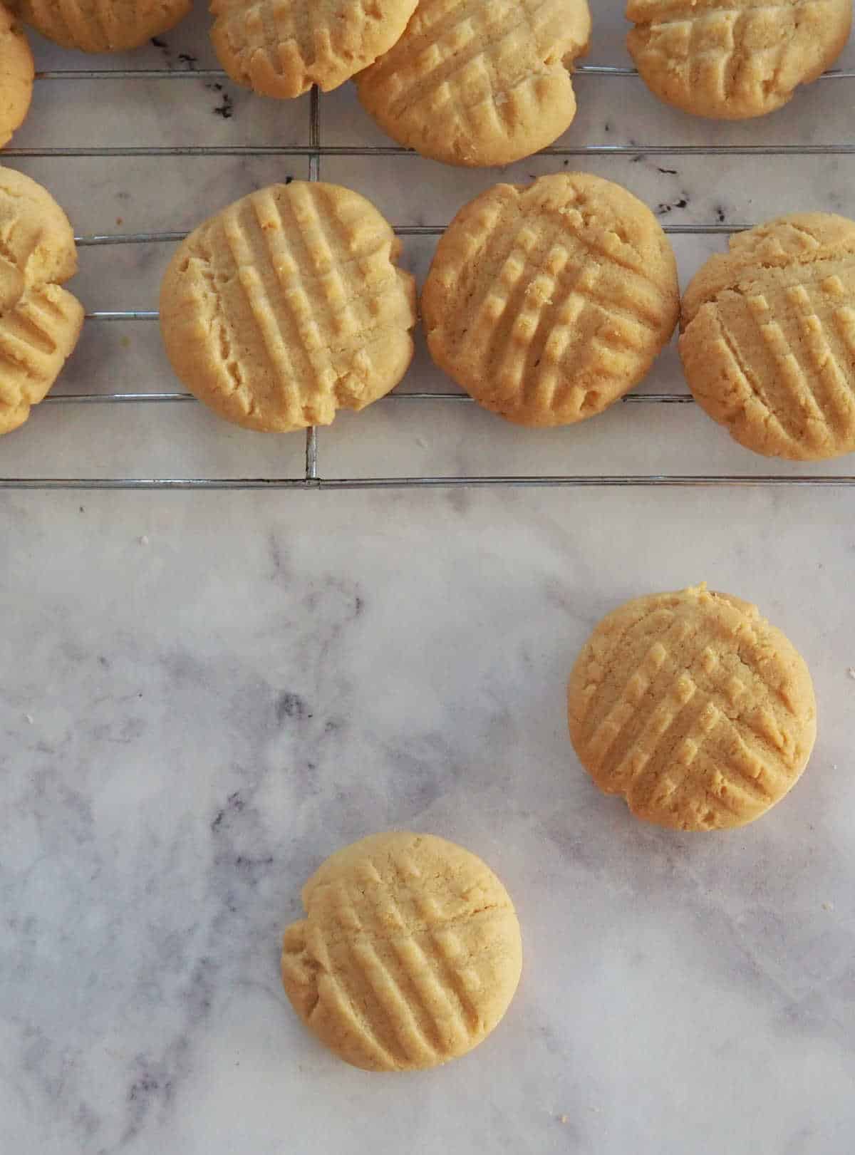 overhead view of peanut butter biscuits on cooling rack
