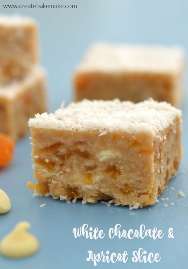 Apricot and white Chocolate Slice on a blue background