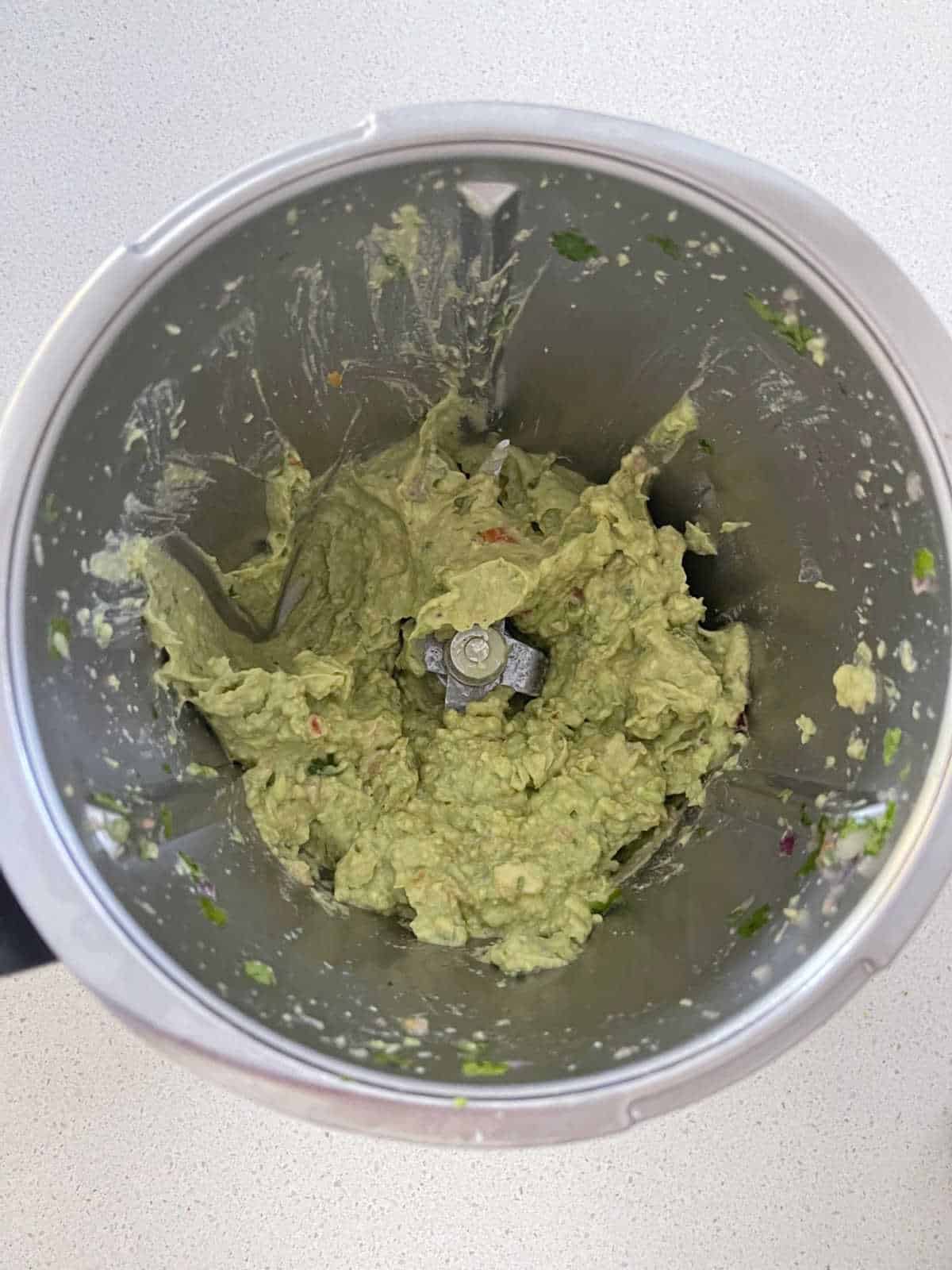 Guacamole in.a thermomix bowl.