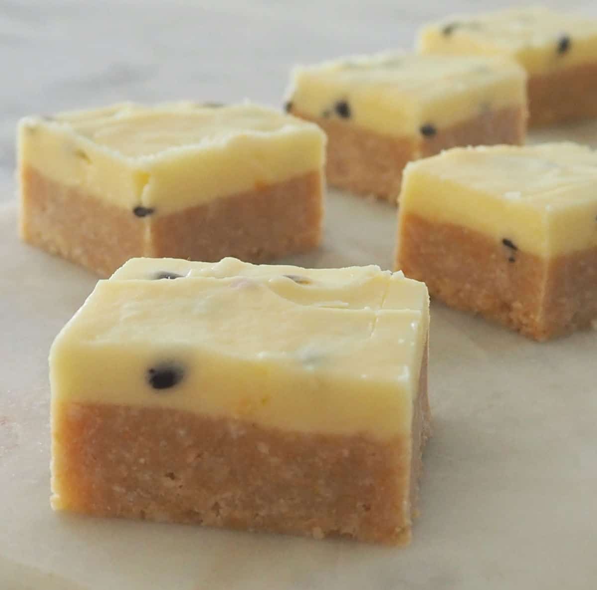 passionfruit slice pieces on a marble tray.