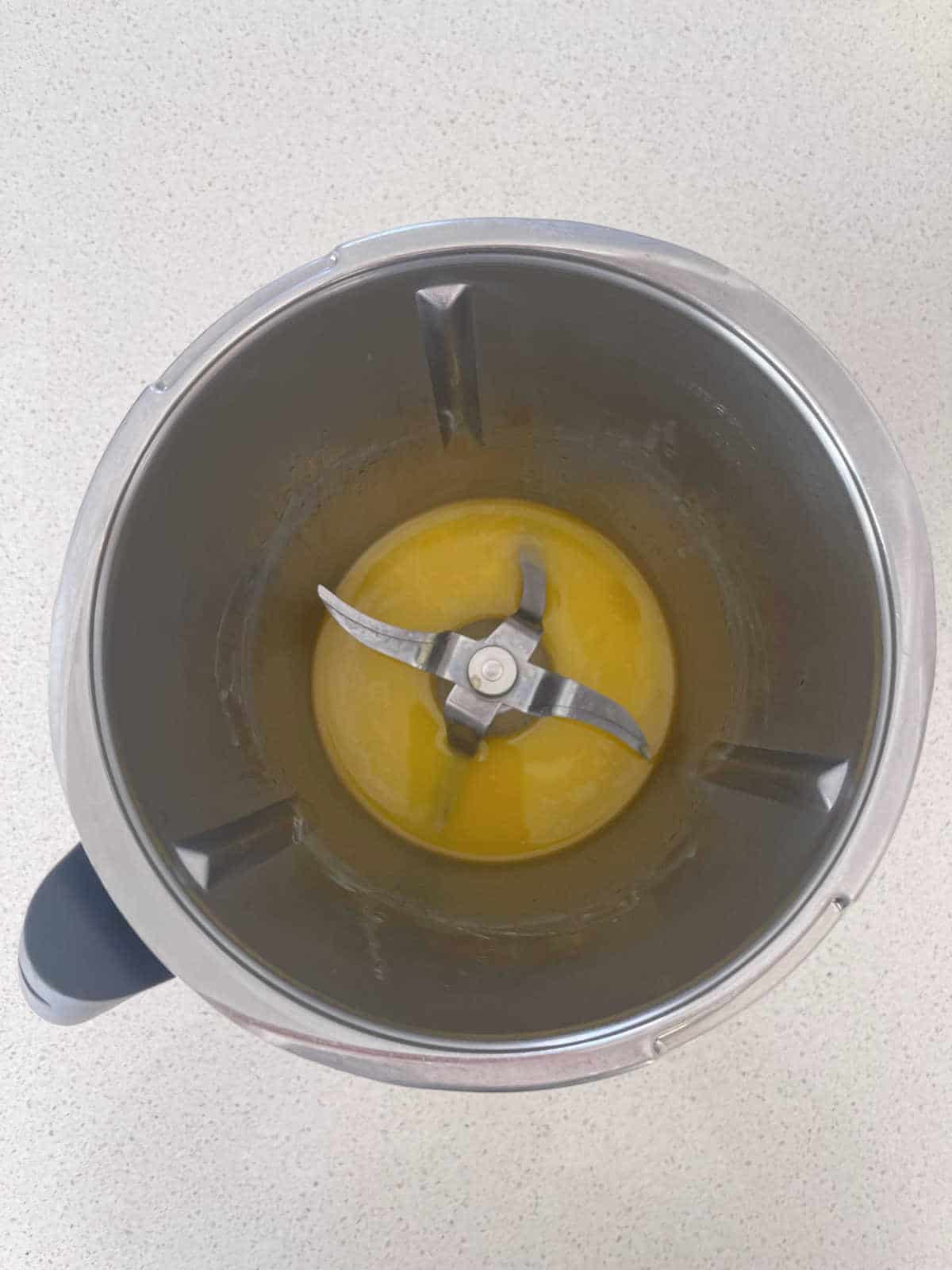 Melted butter in a Thermomix bowl.