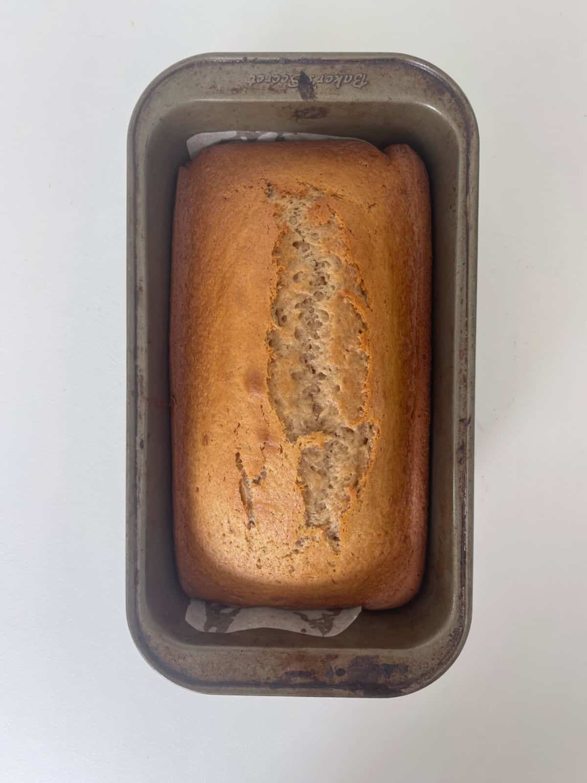 Baked Banana Bread straight out of the oven in a baking tin.