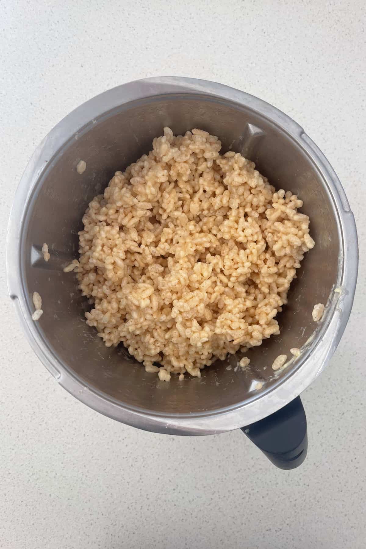 Three Ingredient Rice Bubble Slice mixture in Thermomix bowl.