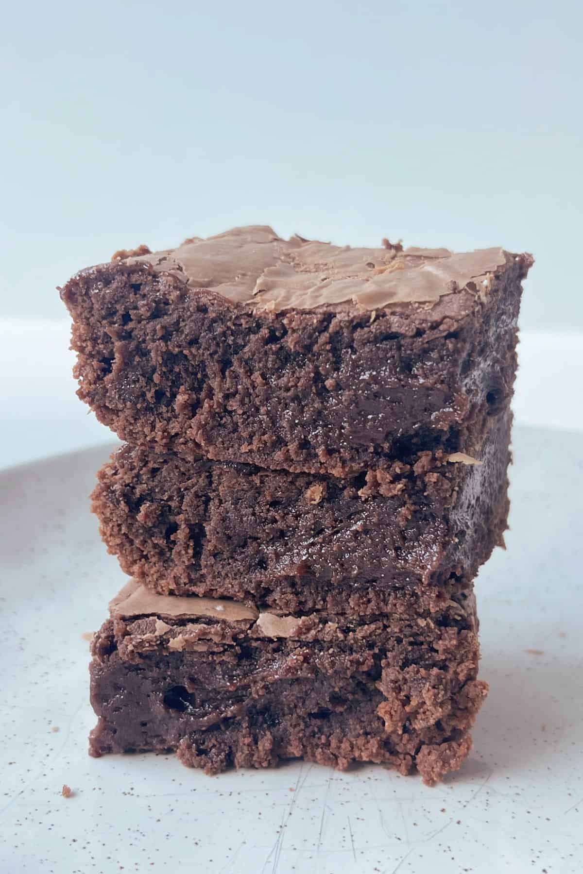 3 Nutella brownies stacked on top of each other.