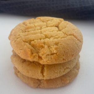 Three Honey Biscuits stacked on top of each other.