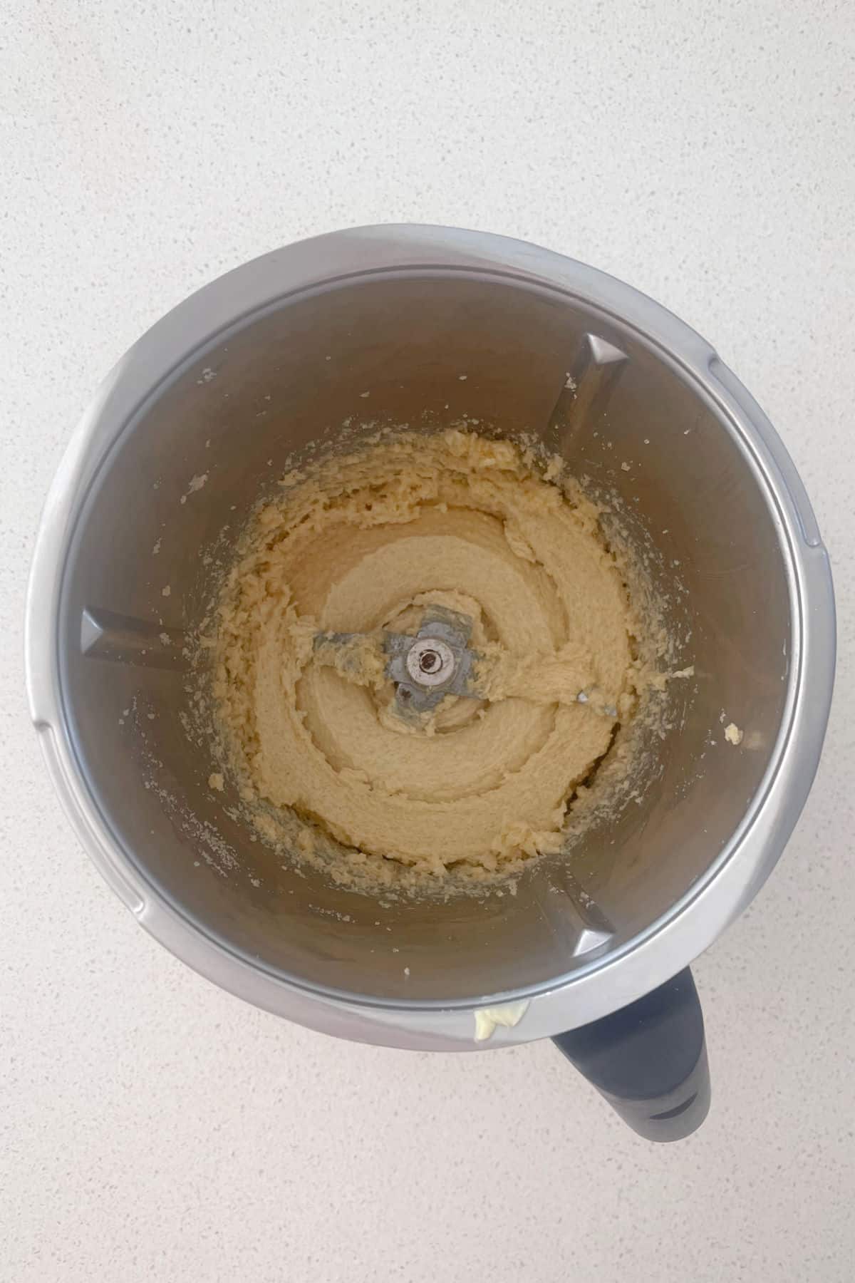 Creamed butter, sugar and honey in a Thermomix bowl.