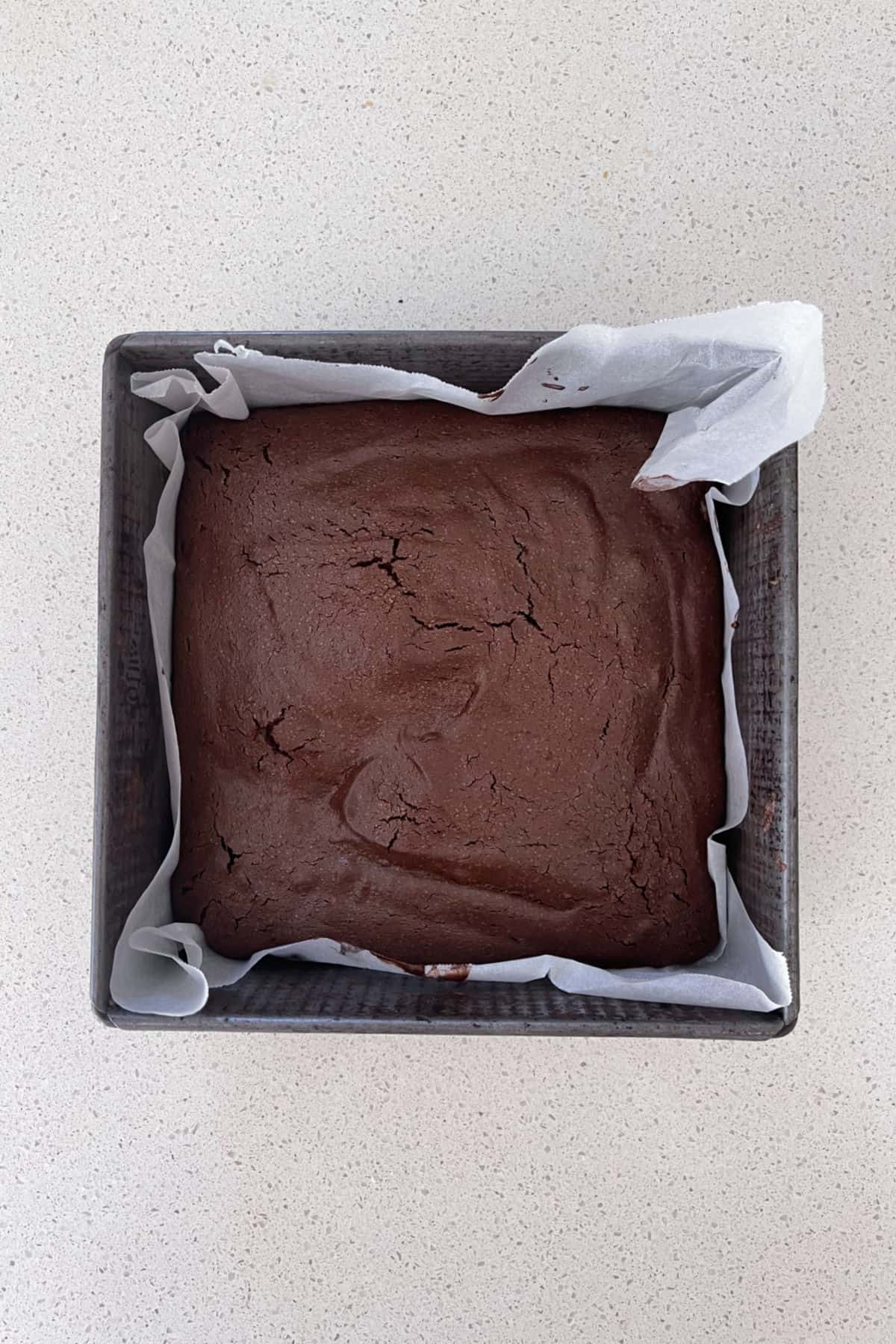 Thermomix Brownies straight from the oven in a baking dish.