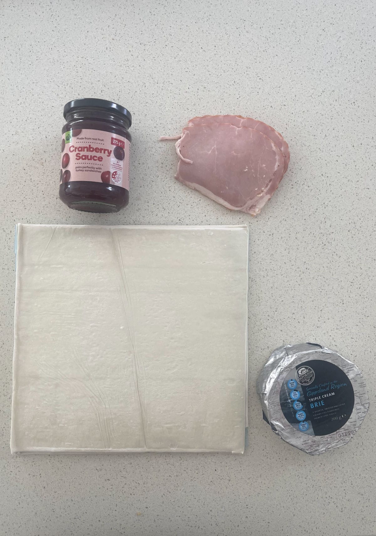 Ingredients to make a Side view of Cranberry and Brie Puff Pastry Star.