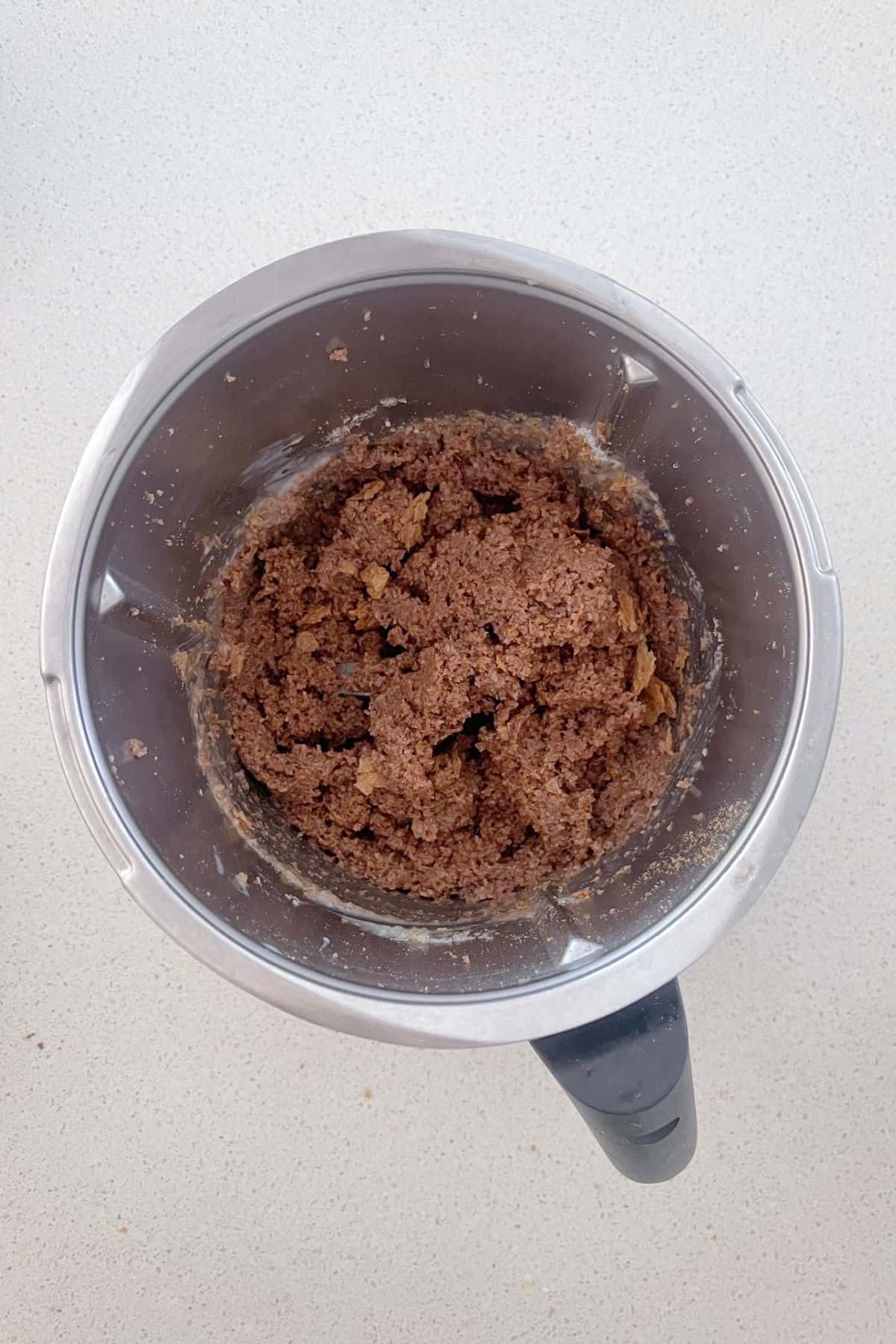 Weet-Bix and Milo Balls ingredients combined in a Thermomix bowl.