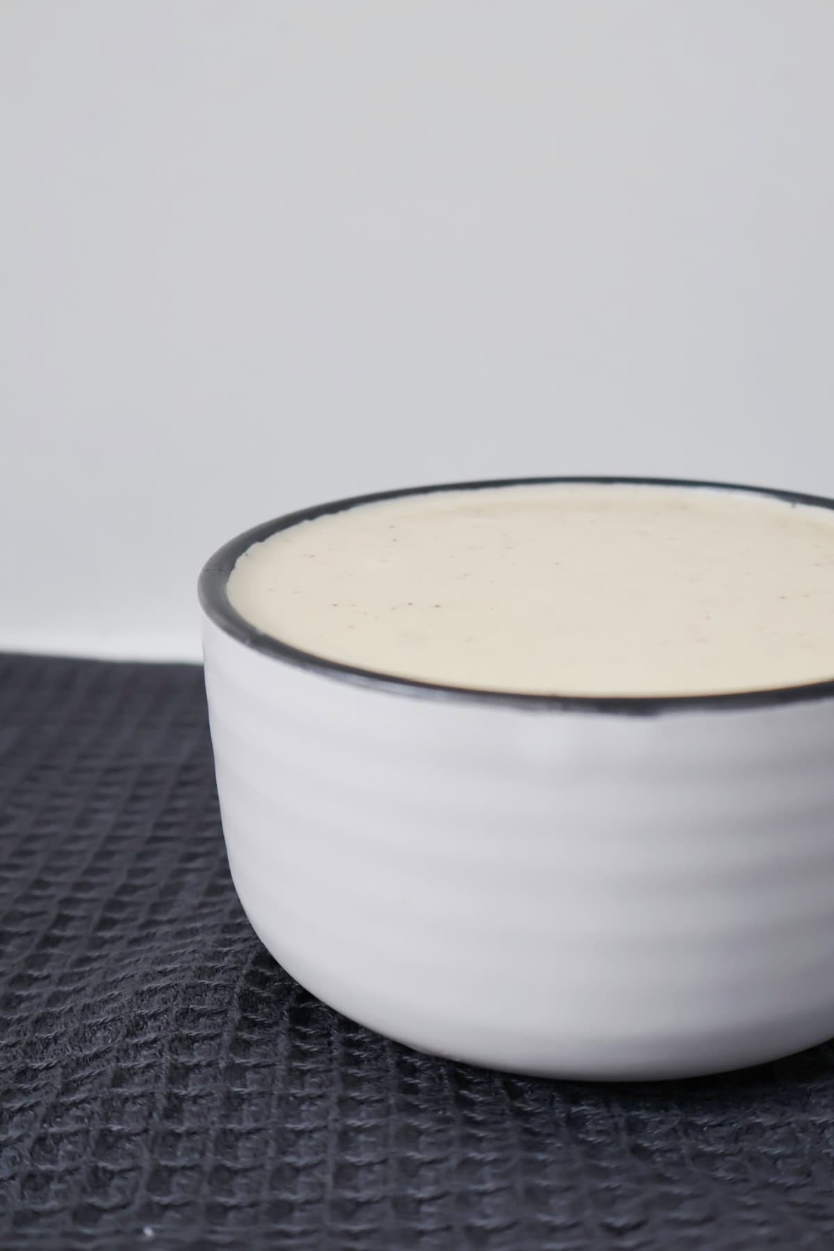 Cheese Sauce in a small white bowl.