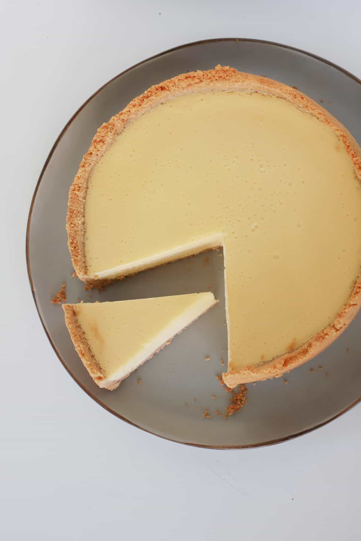 overhead view of baked lemon cheesecake.